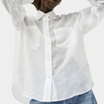 No.6 Lake Shirt in White Organza styled oversized with sheer organza texture, front patch pockets, button front closure, and airy lightweight structure.