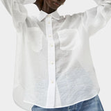 No.6 Lake Shirt in White Organza styled oversized with sheer organza texture, front patch pockets, button front closure, and airy lightweight structure.