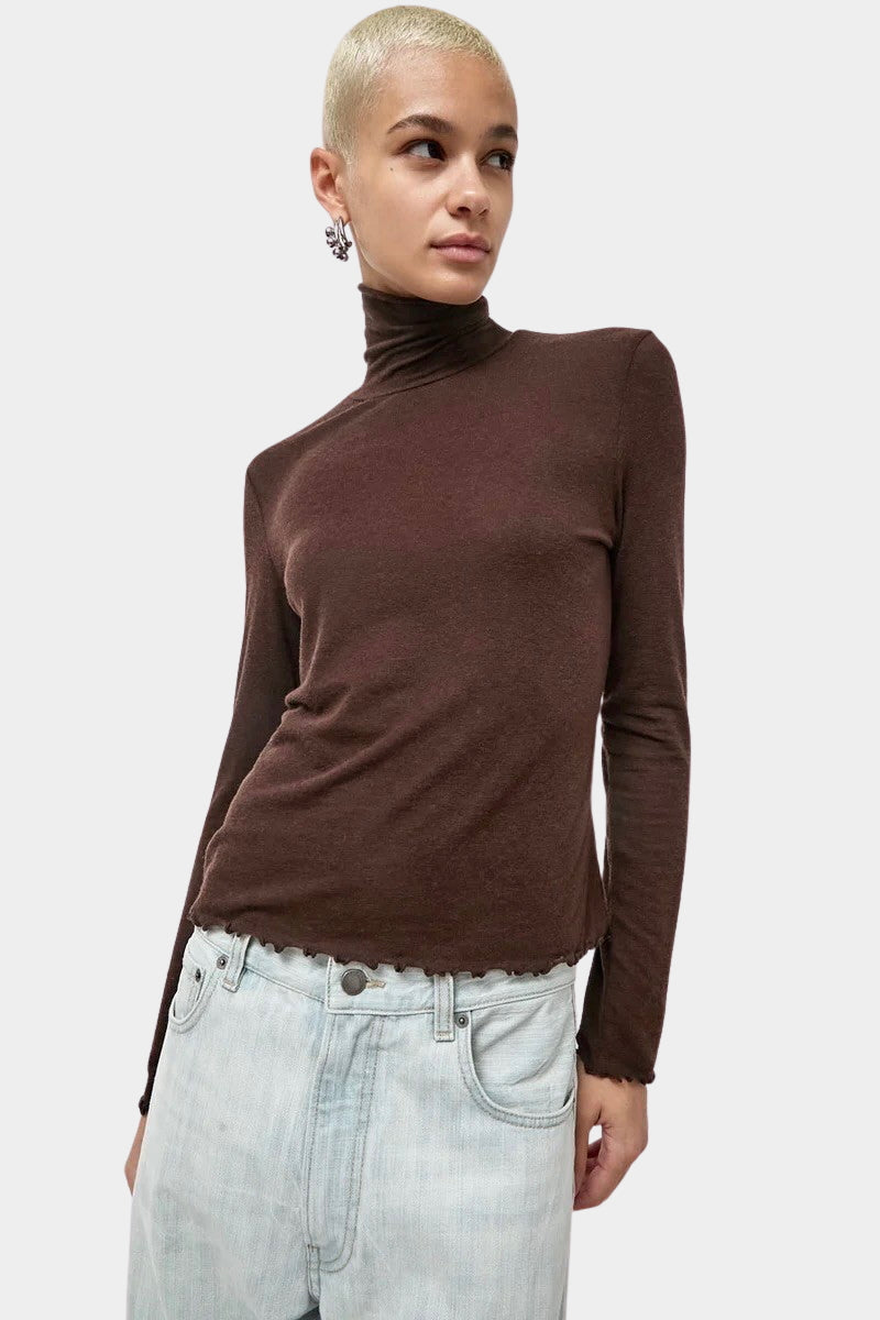 No.6 Lennon Turtleneck in Espresso, front view with lettuce hem and light denim at YUCCA Denver
