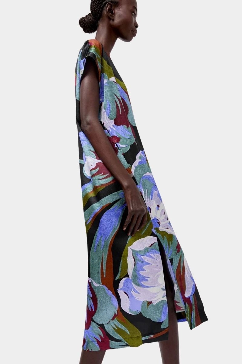 No.6 Marion Dress in Peony floral silk midi dress side view highlighting fluid drape and slit
