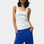 Max Top in White by No.6 styled with cobalt blue pants in an effortless everyday look
