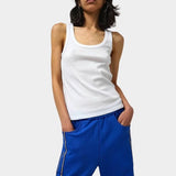 Max Top in White by No.6 styled with cobalt blue pants in an effortless everyday look