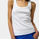 Max Top in White by No.6 white cotton scoop neck tank top with wide straps and slim fit styling paired with cobalt blue track pants