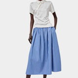 No.6 Mel Skirt in Eton Stripe blue and white striped cotton midi skirt styled with cream polo and white sunglasses full look