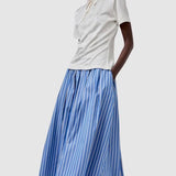No.6 Mel Skirt in Eton Stripe blue and white striped cotton midi skirt styled with cream polo top front view