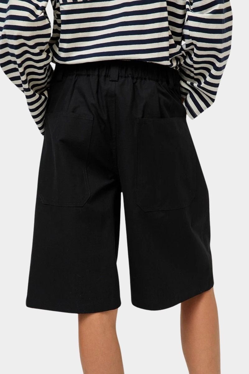 No.6 Mick Short in black cotton ripstop bermuda shorts close up back view with patch pocket detail