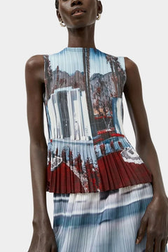 Sculptural pleated tank top in Cinema print with fluid drape and architectural shape at SHOP YUCCA Denver