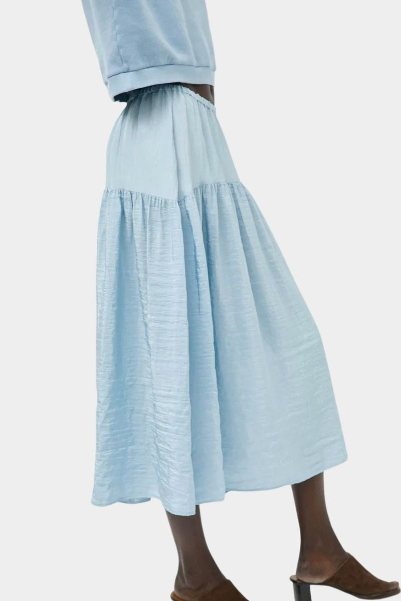 No.6 Sky blue midi skirt with curved yoke and airy textured fabrication at SHOP YUCCA Denver