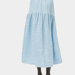Back view of No.6 Sophia Skirt Sky featuring elastic waistband and full gathered skirt at SHOP YUCCA Denver