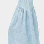 Side view of No.6 Sophia Skirt Sky with fluid drape and lightweight textured fabric at SHOP YUCCA Denver