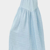Side view of No.6 Sophia Skirt Sky with fluid drape and lightweight textured fabric at SHOP YUCCA Denver