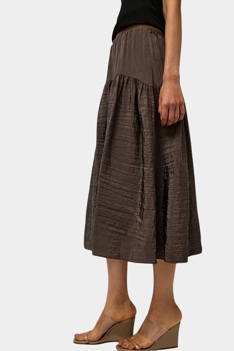 Relaxed textured skirt in deep slate tone with elastic waistband and full silhouette at SHOP YUCCA Denver