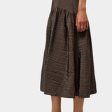 Relaxed textured skirt in deep slate tone with elastic waistband and full silhouette at SHOP YUCCA Denver