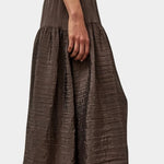 Side profile of slate grey midi skirt with fluid drape and subtle shine by No.6 at SHOP YUCCA Denver