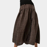 Flowing slate brown midi skirt with crinkled texture and soft volume by No.6 at SHOP YUCCA Denver
