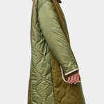 No.6 Summit Jacket in Olive, angled side view showing the two olive tones and quilted texture