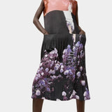 No.6 Tierney Dress in Eclipse styled with side pockets, pleated texture, abstract floral print, and lightweight fluid movement through the skirt.
