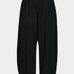 Rachel Comey Ashbolt pant in black, flat lay showing wide-leg silhouette and softly structured shape