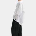 Rachel Comey Ashbolt pant in black, side profile showing sculptural drape and easy silhouette