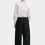 Rachel Comey Ashbolt pant in black, back view highlighting relaxed structure and volume through the leg