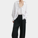 Rachel Comey Ashbolt pant in black, front view highlighting wide-leg shape and fluid texture