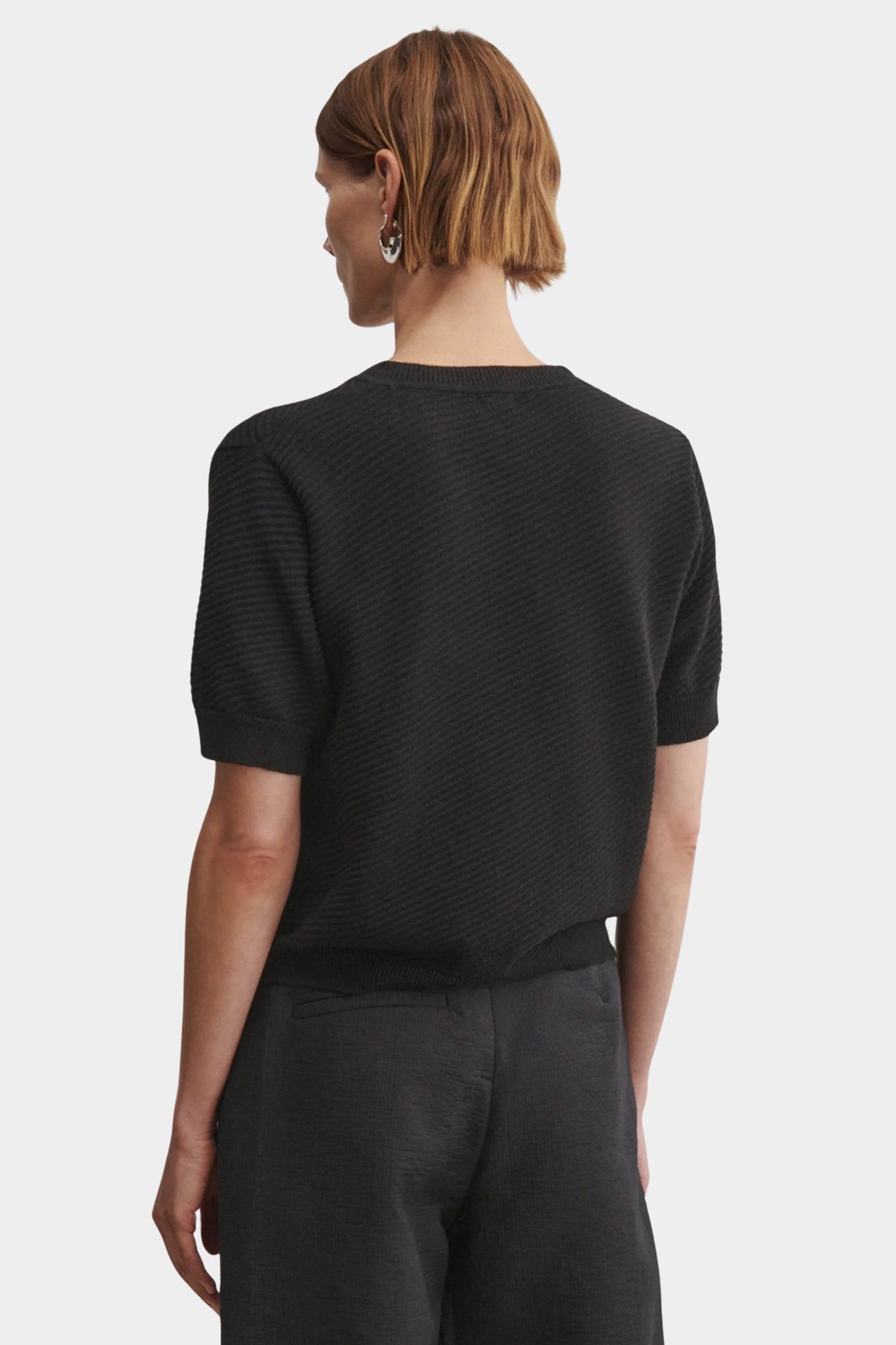 Rachel Comey Calibra Top Black back view with subtle rib texture and easy cropped fit at YUCCA Denver