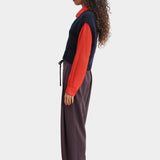 Rachel Comey Corsa Top navy knit vest side profile layered over red shirt