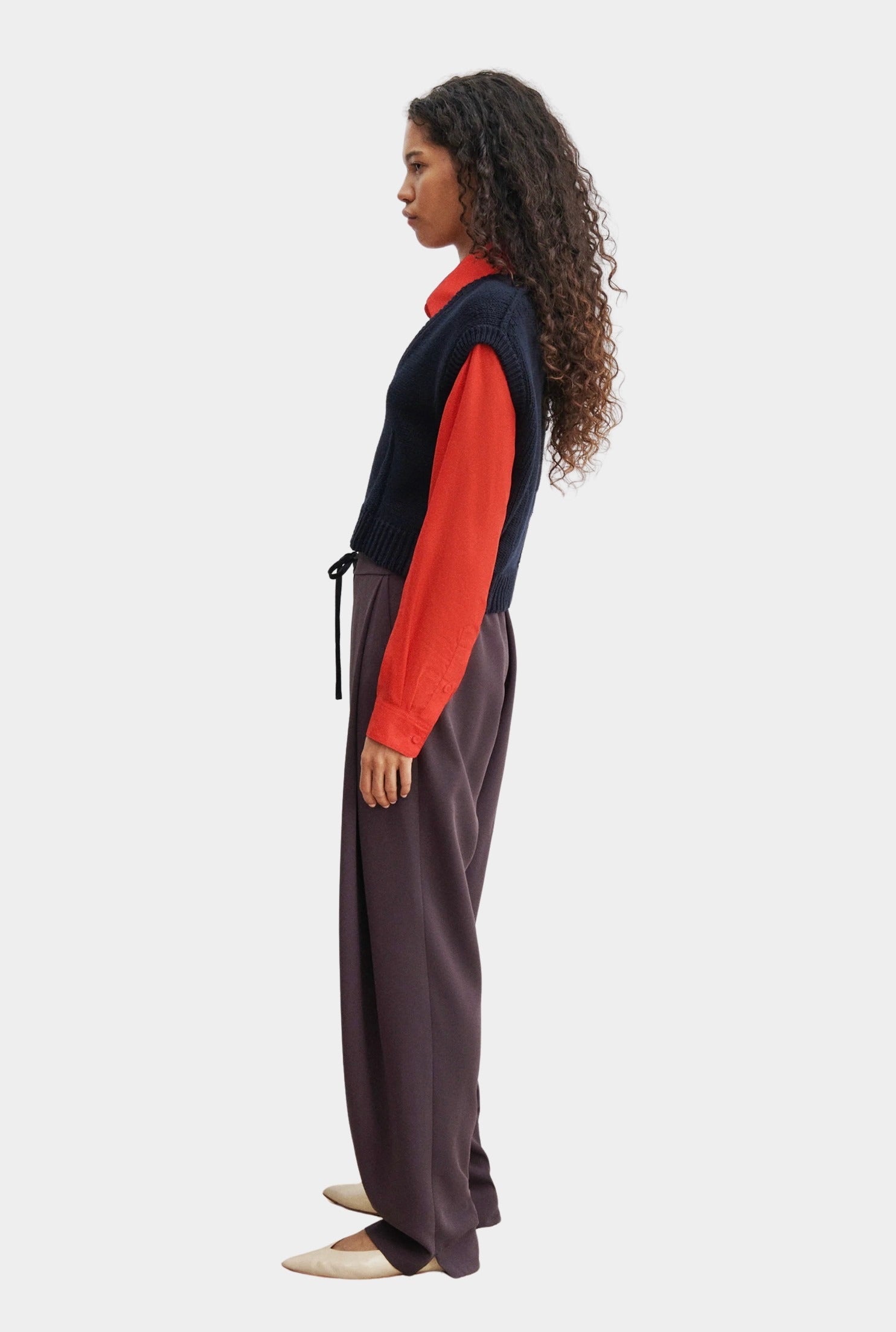Rachel Comey Corsa Top navy knit vest side profile layered over red shirt
