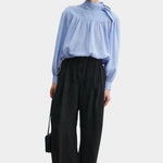 Rachel Comey Dini pant in black, full look showing relaxed wide-leg fit and fluid drape