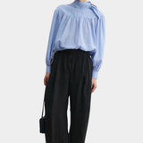 Rachel Comey Dini pant in black, full look showing relaxed wide-leg fit and fluid drape