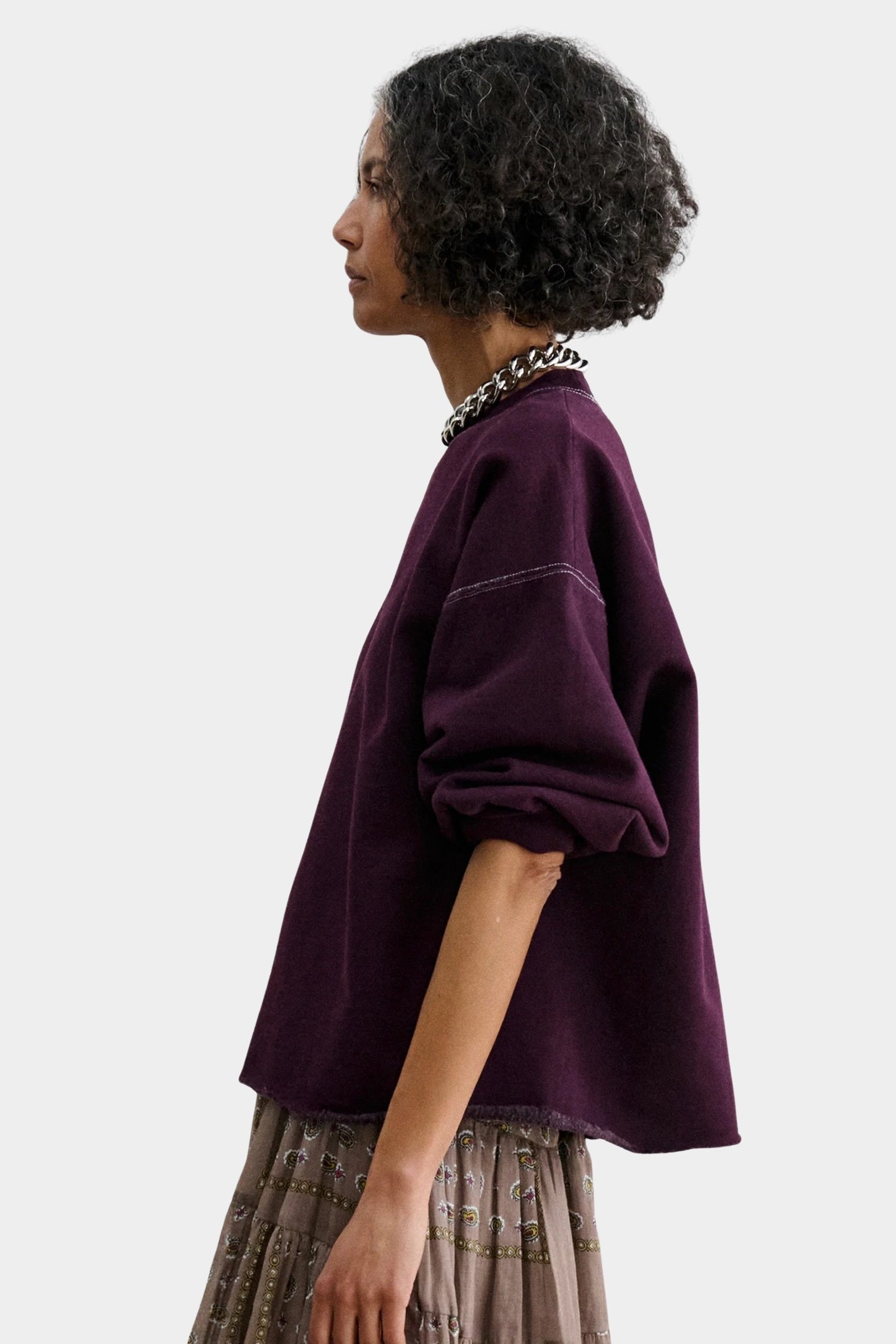 Rachel Comey Fond Sweatshirt Plum side view with dropped shoulder and raw edge hem