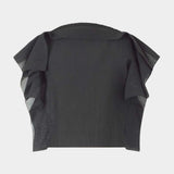 Rachel Comey Rivera top in black with sculptural draped silhouette, sleeveless design, and folded boatneck neckline, flat lay