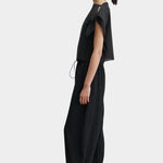 Rachel Comey Rivera Top Black, side profile view highlighting relaxed fit, cropped silhouette, and pleated fabric