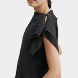 Rachel Comey Rivera Top Black, close-up side view showing pleated texture and layered ruffle sleeve detail