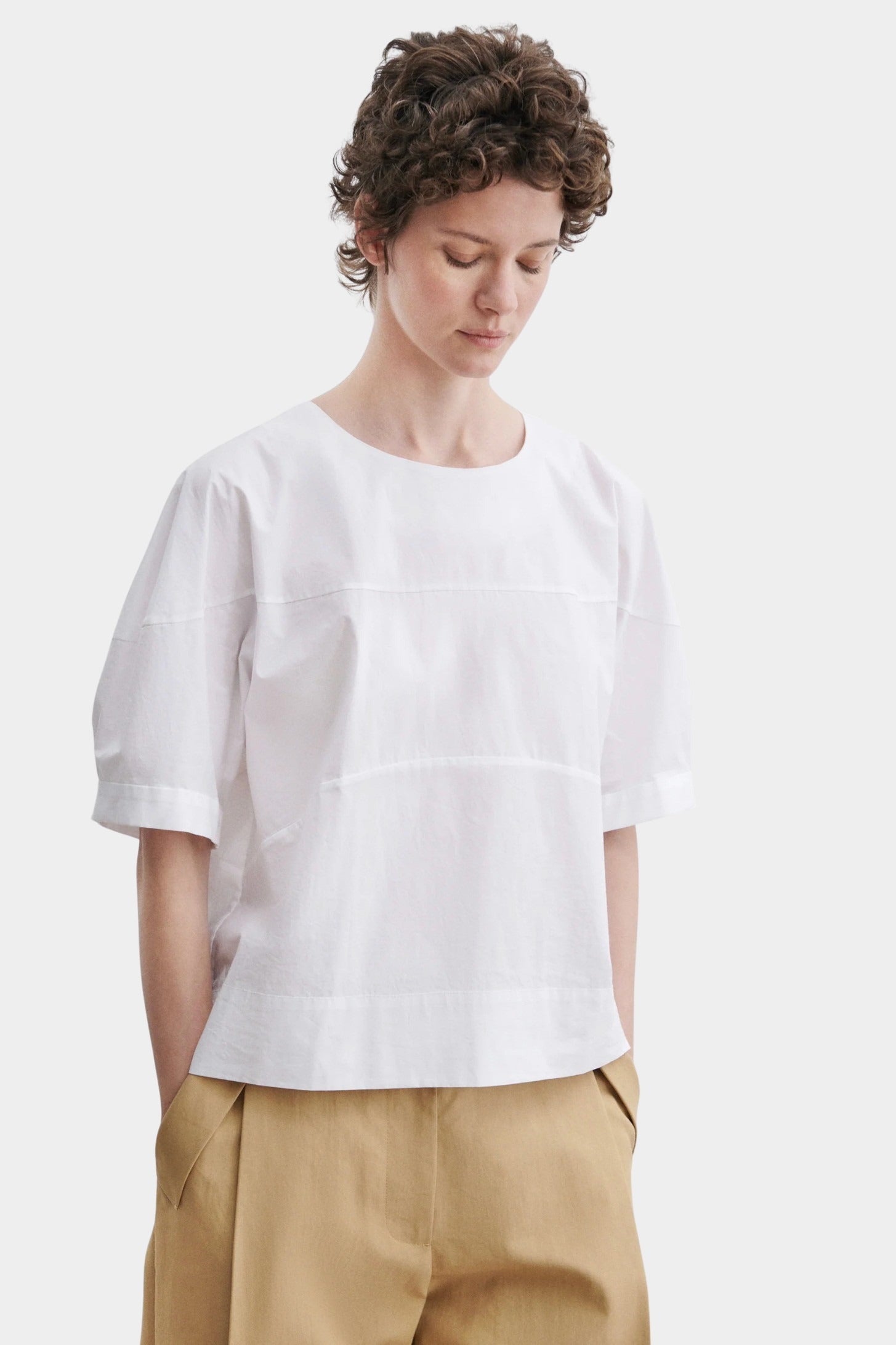 Rachel Comey rugby top in white cotton with wide short sleeves, boxy cropped shape, and minimal seam detailing