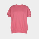 Stanza top in rose cotton, flat lay showing boxy shape, ribbed hem, and short puff sleeves