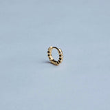 Front view of RAGBAG Studio Oda Mini Hoops with sparkling cubic zirconia stones in gold settings
