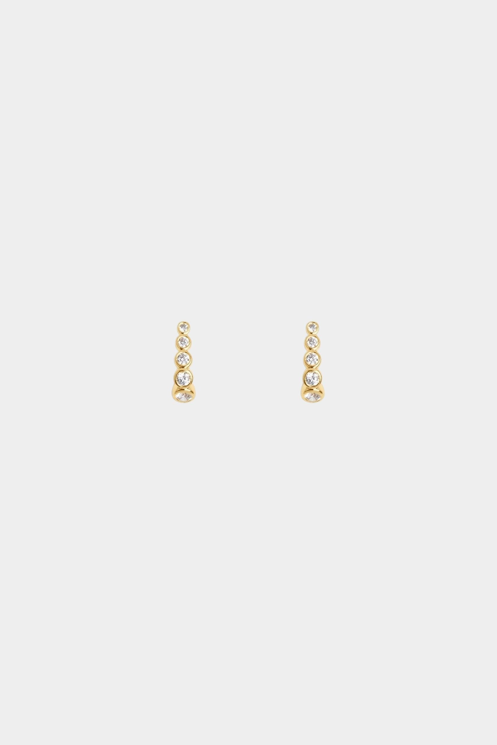 RAGBAG Studio Odette Earrings in Gold with five graduated cubic zirconia stones in a petite vertical setting