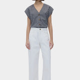 Rita Row Diana Top black gingham cotton V neck button top with cap sleeves styled with white wide leg pants full body view