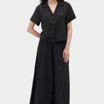 Rita Row Dolors pant in black with white pinstripe wide leg pants styled with matching short sleeve top full look