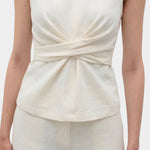 Rita Row Holan top in beige sleeveless top with front wrap waist detail and matching pants front view