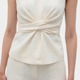Rita Row Holan top in beige sleeveless top with front wrap waist detail and matching pants front view