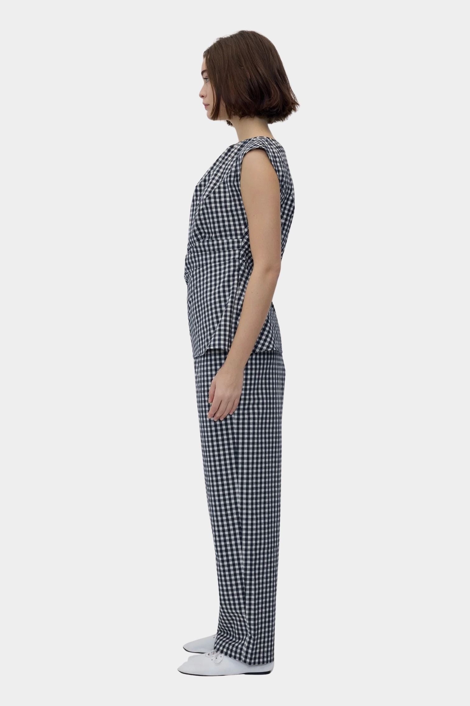 Rita Row Melisande Top black gingham asymmetrical top with draped detail side profile view