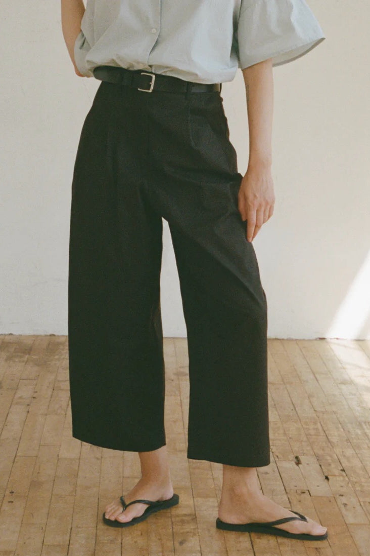 Shaina Mote Boy Trouser Onyx angled view pleated waist structured black wide leg pant