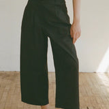 Shaina Mote Boy Trouser Onyx angled view pleated waist structured black wide leg pant