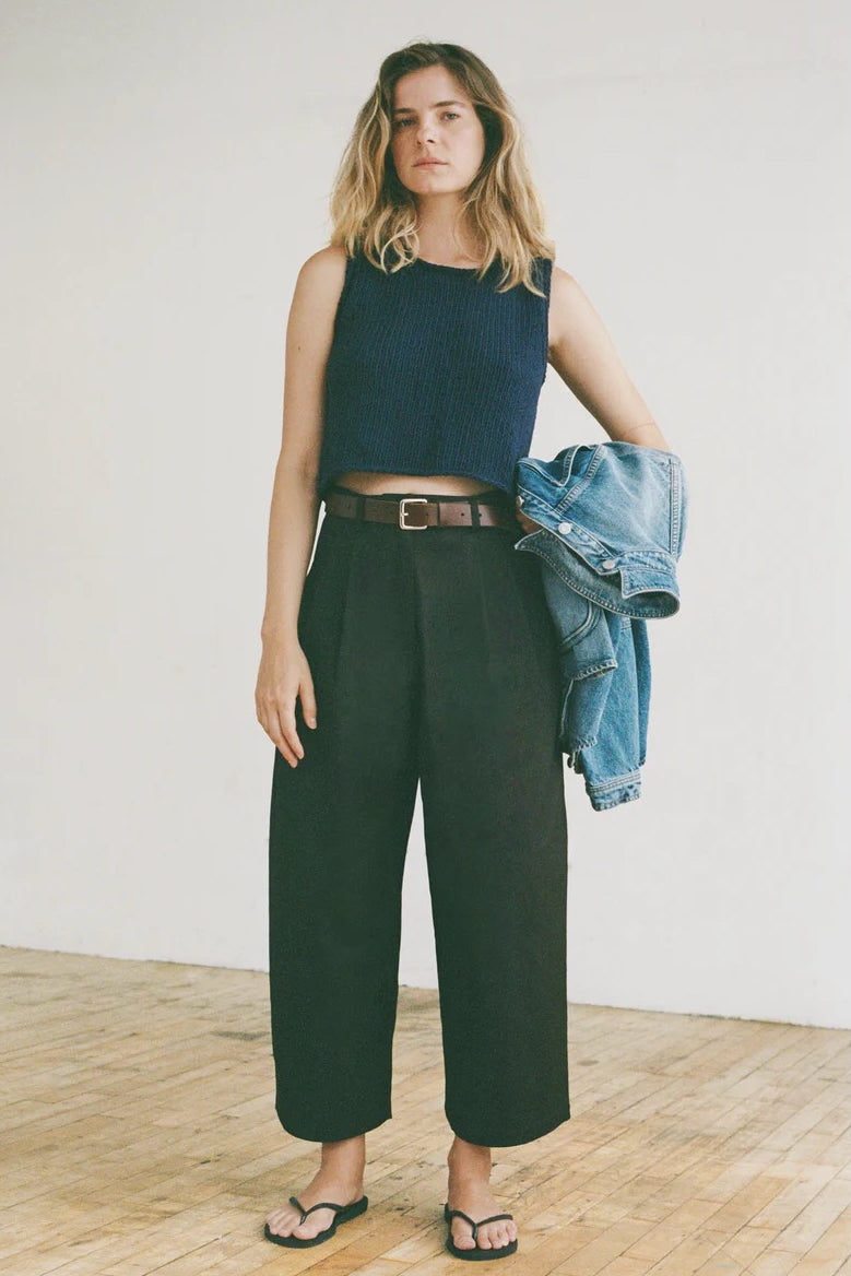 Shaina Mote Brisa Top Dark Iris textured sleeveless knit top detail styled with high-waisted black pants and denim jacket