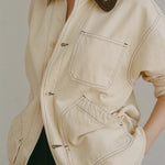 Shaina Mote Painter Coat Butter detail of front patch pockets and stitching on soft butter canvas jacket