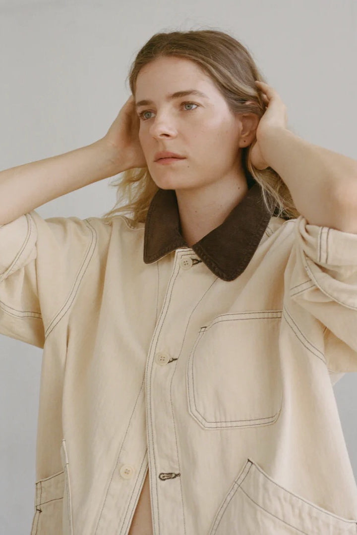 Shaina Mote Painter Coat Butter close-up contrast collar detail with structured stitching and button front