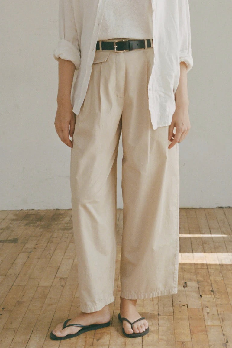 Shaina Mote Summer Chino Beige front view pleated high rise wide leg cotton pant with sandals