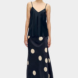 silk laundry long bias cut camisole black front view paired with polka dot skirt